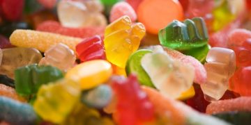 The colorful world of sweets: Compact system consisting of 12 individual pumps meters flavors and colorants with a viscosity of up to 3,000 cps