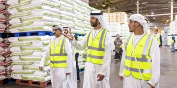 Minister of Economy and Tourism reviews local flour distribution and production operations at Grand Mills