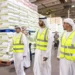 Minister of Economy and Tourism reviews local flour distribution and production operations at Grand Mills
